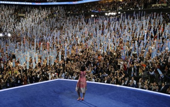 First Lady Michelle Obama walks on stage to speak to the Democratic National Convention in Charlotte, N.C., on Tuesday, Sept. 4, 2012.